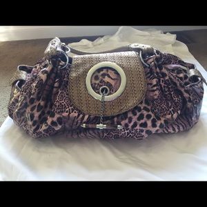 Purple leopard purse